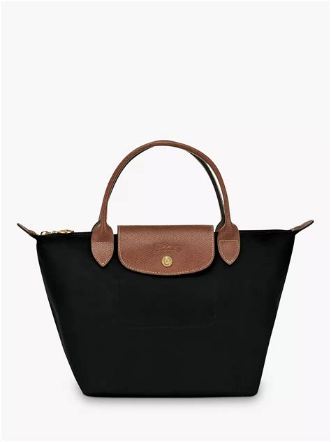 longchamp bag with black handles.